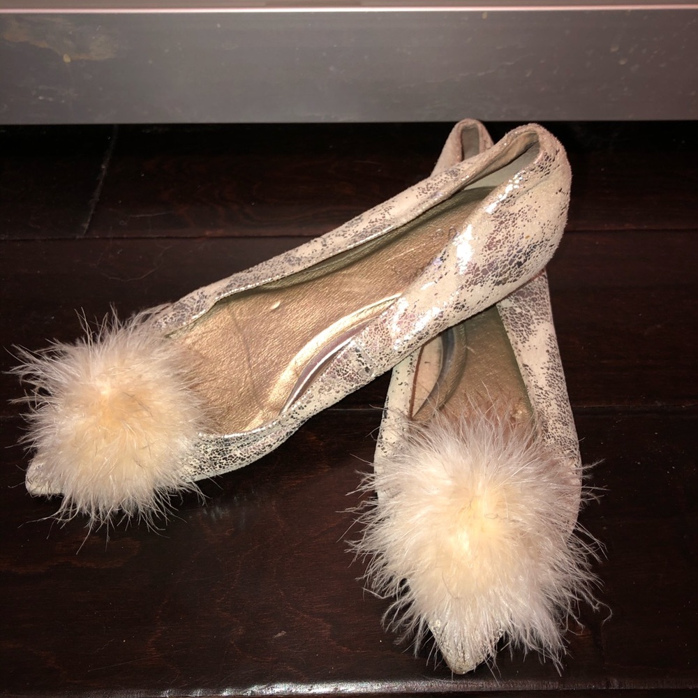 Metallic pointed toe ballet flats with feathers